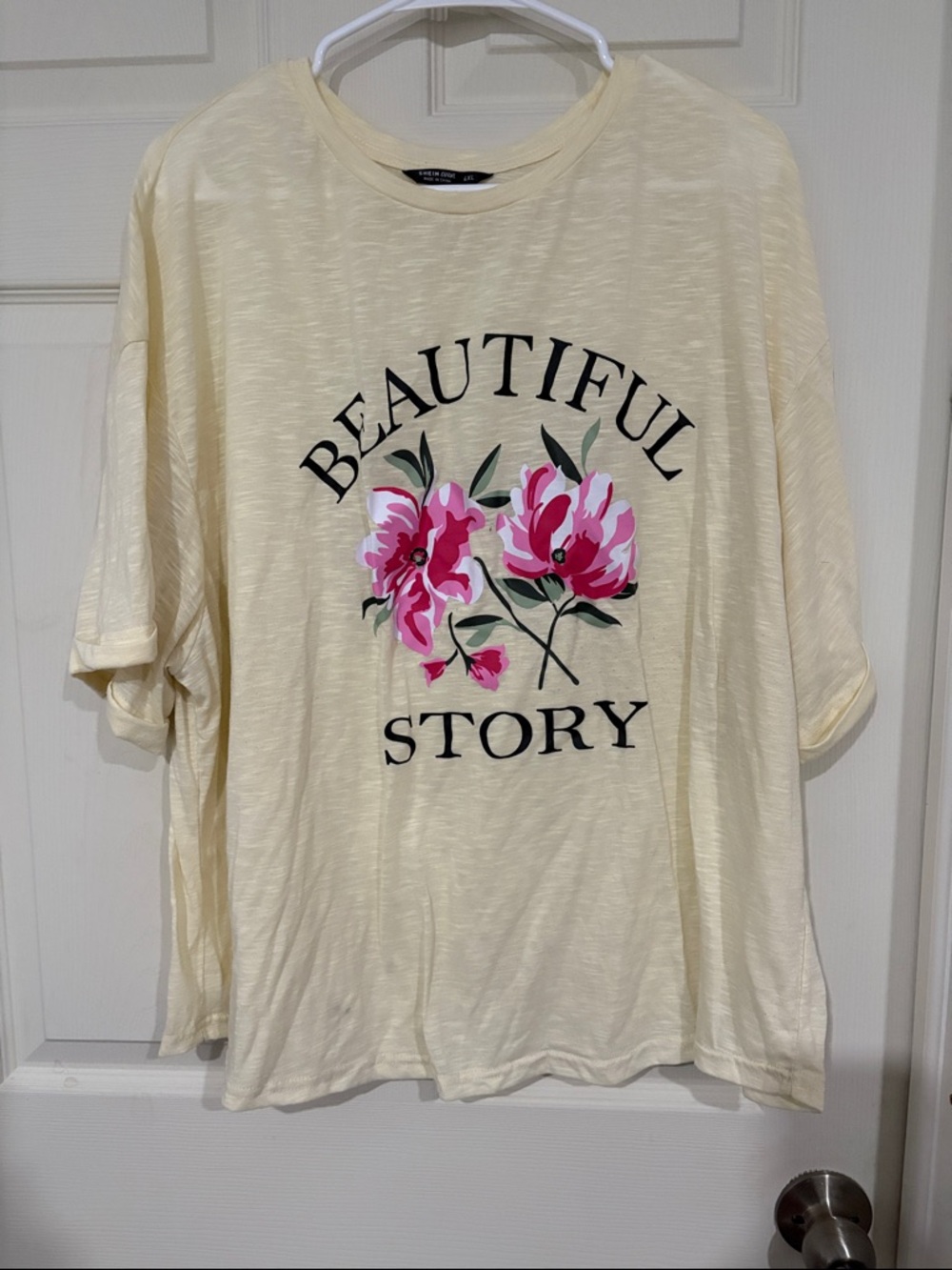 SHEIN Cream Tee with Pink Floral 'Beautiful Story' Graphic